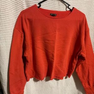 Orange cropped sweatshirt size medium used good condition